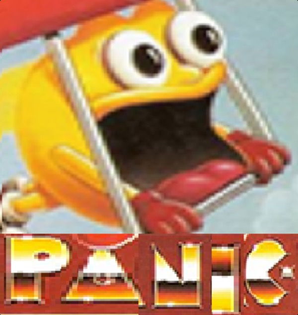 Pac-Man, hang gliding and screaming, captioned “PANIC”