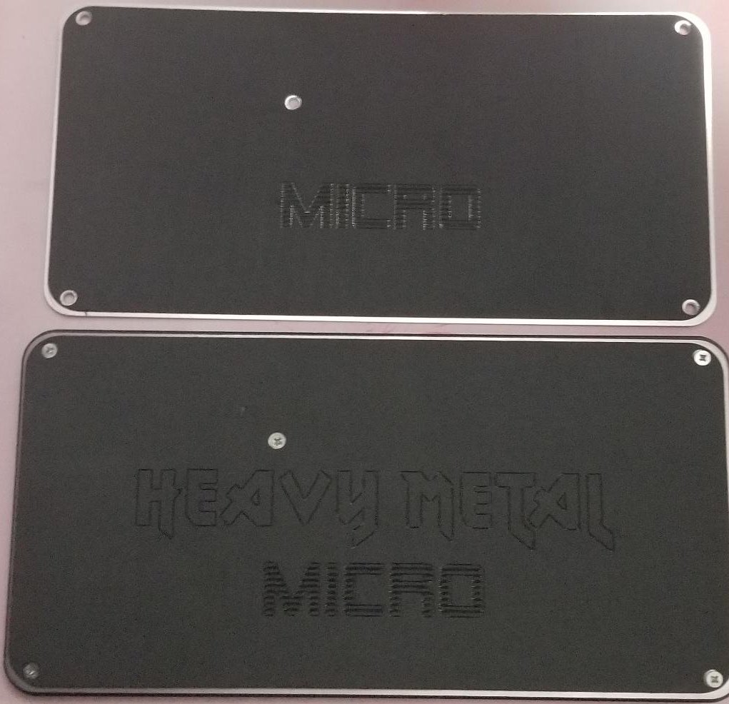 The standard backplate seems irregular and wacky compared to the Heavy Metal plate